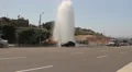 Traffic Moves Past Sheared Fire Hydrant HD Footage