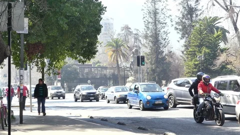 Traffic moves on a sunny day Stock Footage 95909545