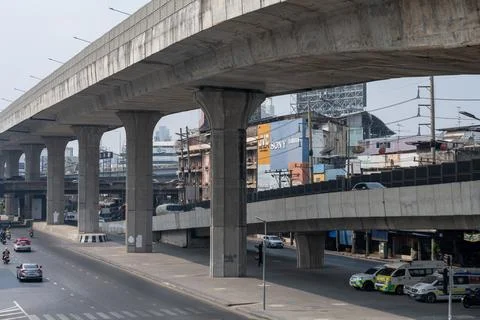 Traffic moving beneath elevated highway in Bangkok Fotos Stock
