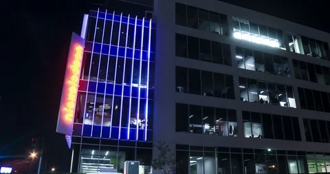 Traffic moving at night in front of Nickelodeon Studios in Burbank, CA Stock-Footage 101857183