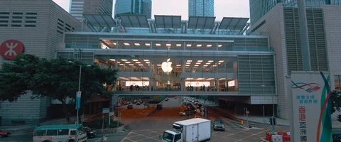 Traffic Moving Through Hong Kong Mall Outside of Apple Stock Footage 122009151