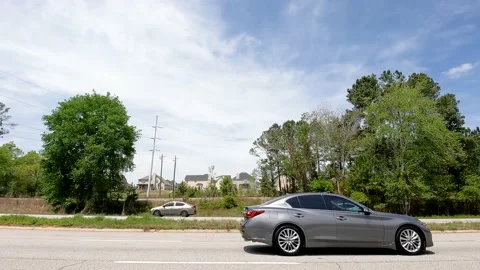 Traffic on a multi lane highway in super slow motion gray and black car cars Stock Footage 180131584