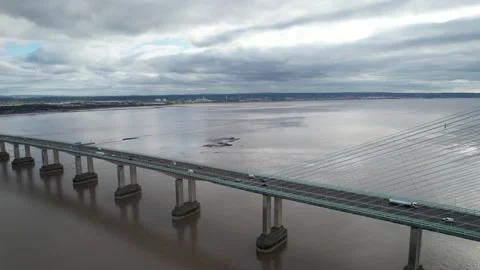 Traffic on multilane bridge over wide river Stock-Footage 166635655