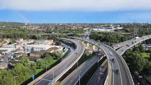 Traffic on multilevel and multilane highway interchange in city Stock-Footage 164840083