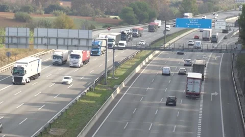 Traffic in multiple lane highway Stock Footage 142318196