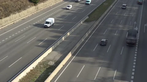 Traffic in multiple lane highway Stock Footage 142318212