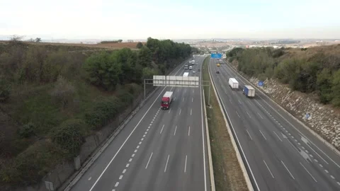 Traffic in multiple lane highway Stock Footage 142318215