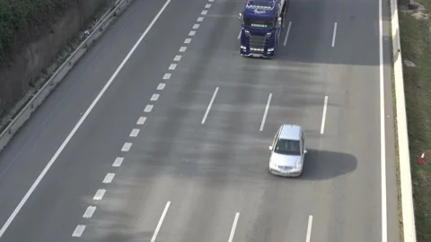 Traffic in multiple lane highway Stock Footage 142318275