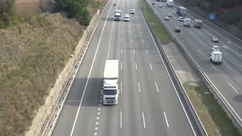 Traffic in multiple lane highway Stock Footage 142318334