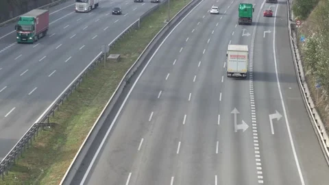 Traffic in multiple lane highway Stock Footage 142318344