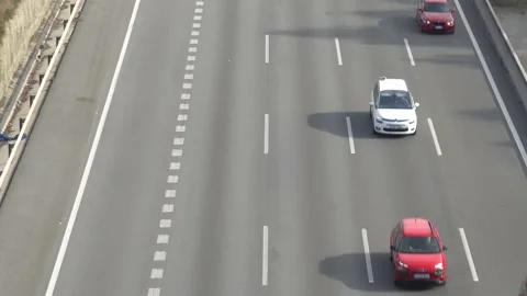 Traffic in multiple lane highway Stock Footage 142318366