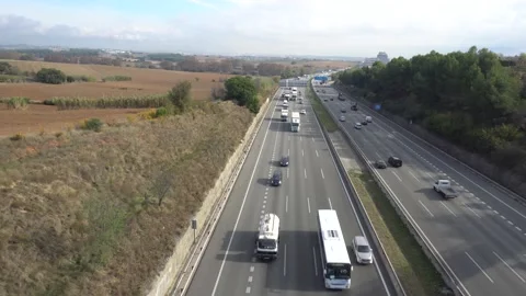 Traffic in multiple lane highway Stock Footage 142318404
