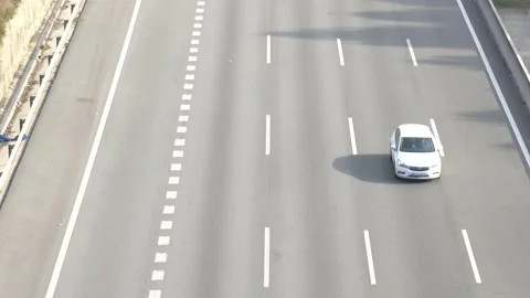 Traffic in multiple lane highway Stock Footage 142318431