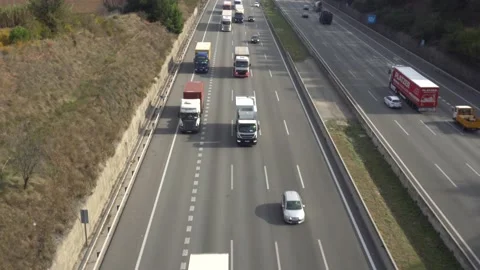 Traffic in multiple lane highway Stock Footage 142318552