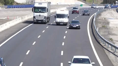 Traffic in multiple lane highway Stock Footage 238401547