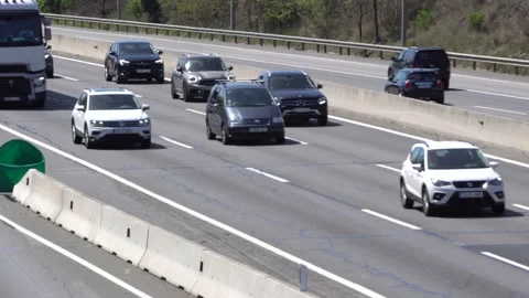 Traffic in multiple lane highway Stock Footage 238401620