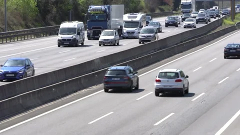 Traffic in multiple lane highway Stock Footage 238401696