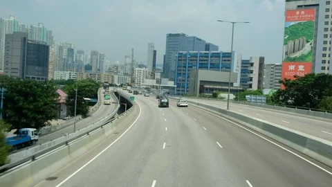 Traffic on multiple lane highway in Hong Kong Stock Footage