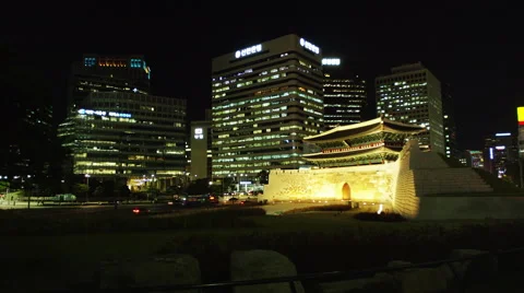 Traffic at Namdaemun Gate at Night Stock Footage 61630698
