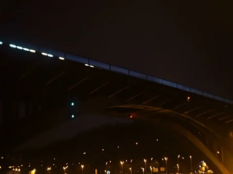 Traffic on the night bridge, tower of orthodox church view Stock Footage 71869097