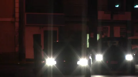 Traffic at night, lighthouse, Catania Stock Footage 8829010