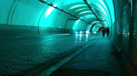 Traffic at night in a tunnel Stock Footage 55649315