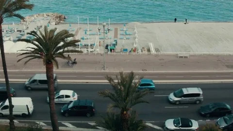 Traffic in Nizza with seafront in the back Stock Footage 69175428