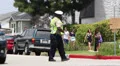 Traffic Officer directs traffic in Los Angeles HD Footage