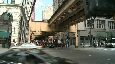 Traffic passes beneath Chicago's L (2 of 2) Video stock 821854
