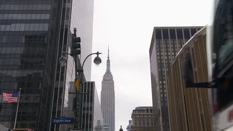 Traffic Passes On Eighth Avenue With Impressive Iconic New York Skyscrapers  Stock Footage 114058062
