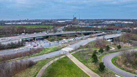 Traffic passes under the highway track bridge outside of city , Hyperlapse Stock-Footage 171930236