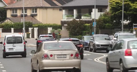 Traffic passing by from behind - 4K Stock Footage 85320106