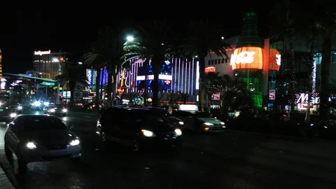 Traffic passing down the Las Vegas strip at night Stock Footage 106622641