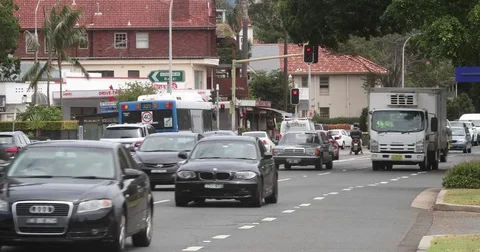 Traffic passing by from the front - 4K Stock Footage 85320242