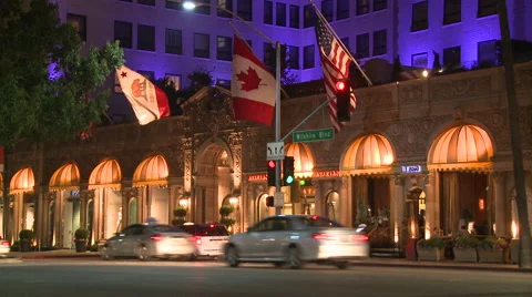 Traffic passing in front of the luxurious Beverly Wilshire hotel in Los Angeles Stock Footage 46613789