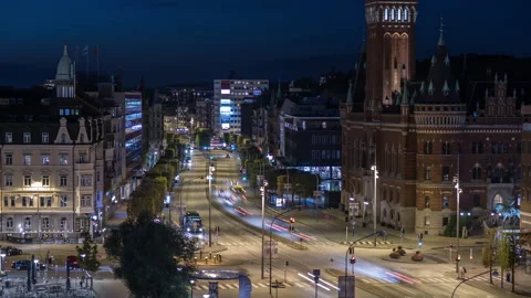 Traffic Passing Helsingborg Town Hall at Night, Timelapse Stock Footage 343791184