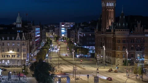 Traffic Passing Helsingborg Town Hall at Dusk, Timelapse Stock Footage 343796702