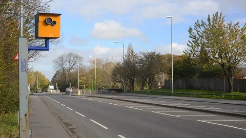 Traffic passing speed camera leeds yorkshire united kingdom Stock Footage 82936226