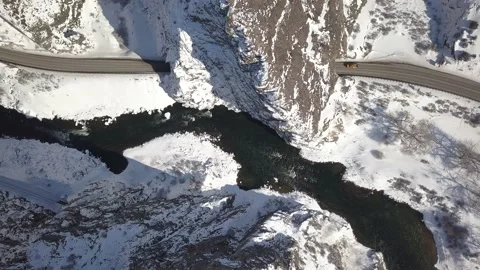 Traffic passing through mountain tunnel from above Stock Footage 166129034