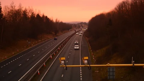 Traffic passing warning sign of average speed cameras uk Stock Footage 88084547
