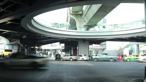 Traffic at Pathumwan intersection, Sukhumvit road Bangkok Thailand, March 12, 20 Stock Footage 87008837
