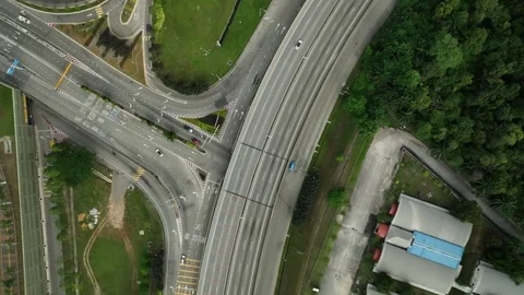 Traffic patterns and road intersections n a green urban environment Stock Footage 311987412