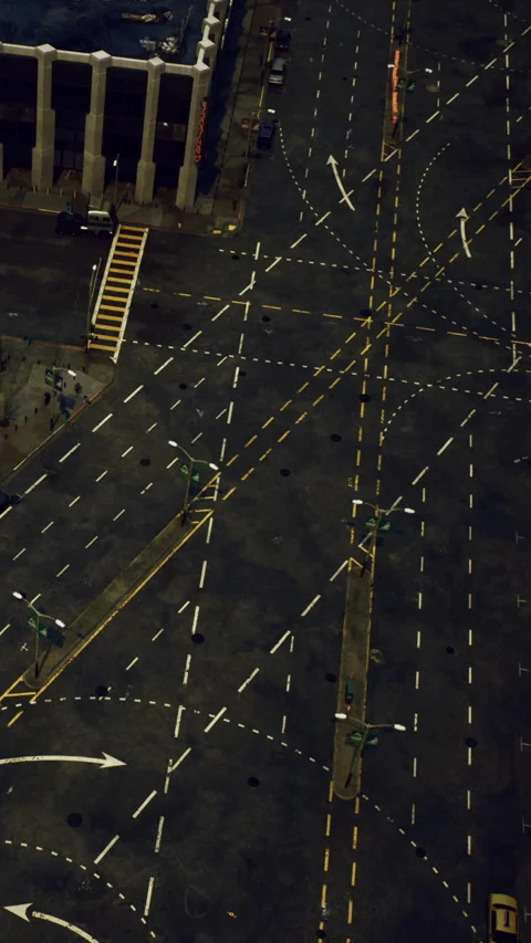 Traffic patterns at a busy intersection near a city center during the day Stock Footage 335974140