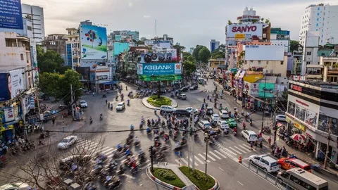 Traffic at Phu Dong roundabout, Ho Chi Minh City downtown, Vietnam time lapse Stock Footage 116860751