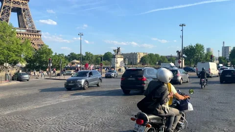 Traffic on the Place de Varsovie square in front of the Eiffel Tower in Paris Stock Footage 200182205