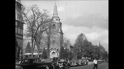 A traffic policeman and a hardware store worker and students and a church, Stock Footage 88873633