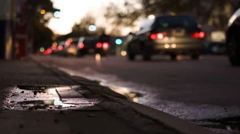 Traffic from a puddle Stock Footage 40029680