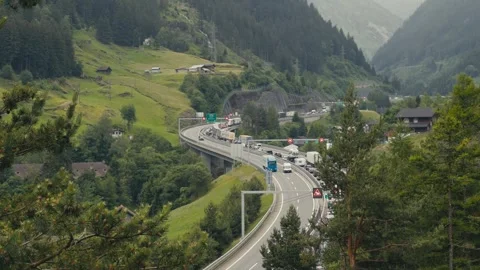Traffic Queue Before Gotthard Tunnel with Cars and Trucks in Switzerland Vídeos de archivo 337559012