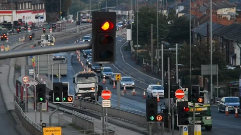 Traffic queueing at roadworks in the city of leeds united kingdom Stock Footage 68703531
