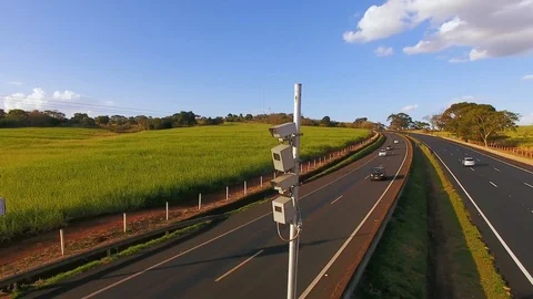 Traffic radar with speed enforcement camera in a highway. Stock Footage 93899270